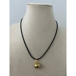 Gold tone puffed heart necklace